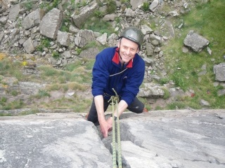 Steve climbing at Logie Head