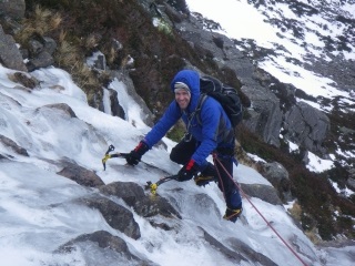 John ice climbing