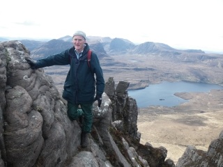 Paul scrambling on Stac Pollaidh
